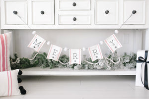 "Merry" canvas banner with pom-poms