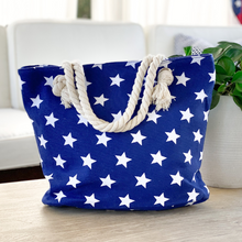 Load image into Gallery viewer, Blue Star Canvas Tote with Tied Rope Handles
